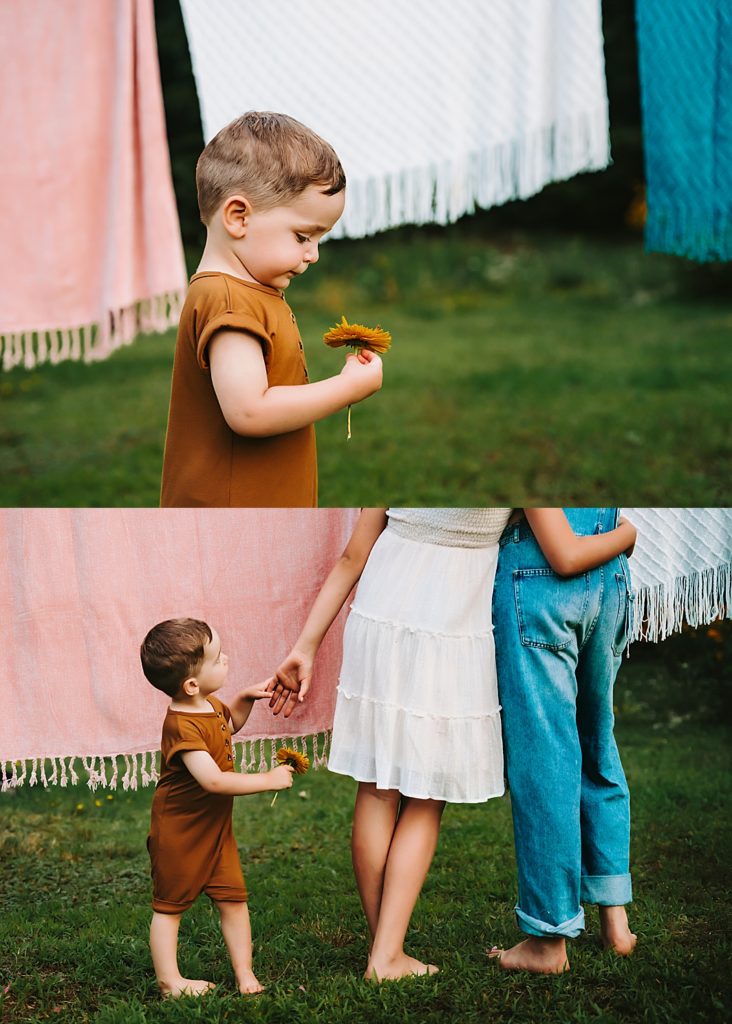 A little boy holding a flower with his family, by Jessica Rockowitz, an Austin Family Photographer