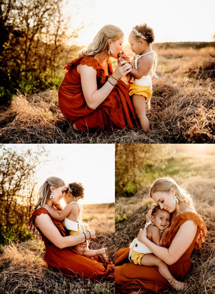Mom in a rust dress snuggling her newborn at Commons Ford Ranch Park in Austin, Texas.