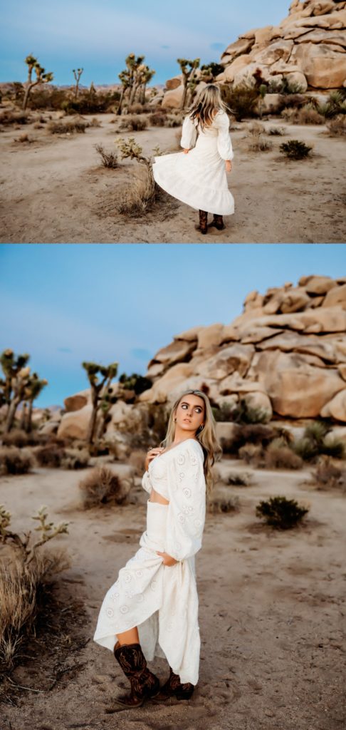 A teenage girl in the desert posing in a white maxi dress. 