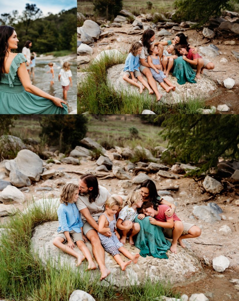 Mom and dad snuggling with their kids on a rock in Austin, Texas. 